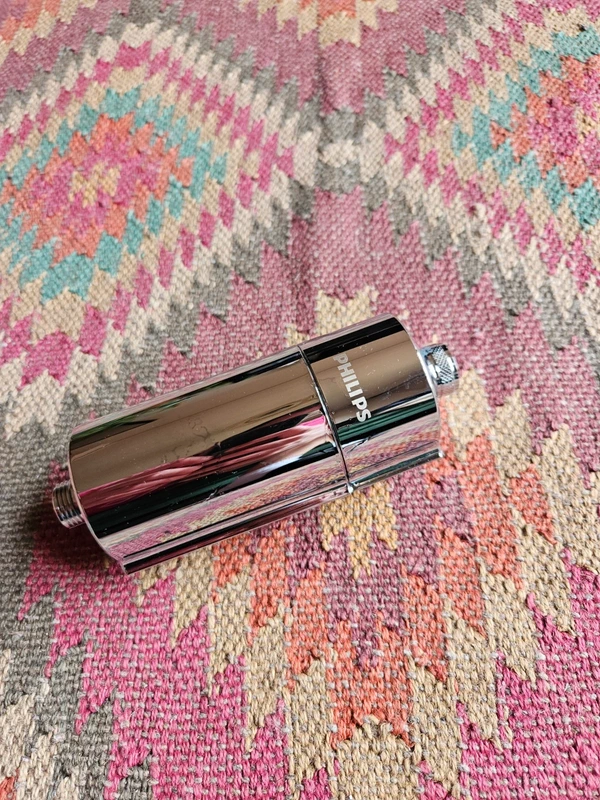Original product photo on a patterned rug